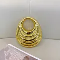Elegante bolso de acrílico dorado con textura en capas y asa redonda retro - Oro Claro
