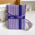 Detail of purple houndstooth knitted phone bag with GRACE logo and fabric strap - Bow Houndstooth Purple