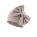 Detailed view of dusty rose ribbed knit texture and large bow on baby beanie - Milk Tea (Bow Turban Hat)