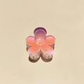 Macro detail of gradient pink flower hair claw clip with subtle glitter finish - Colorful Plumeria Orange Purple