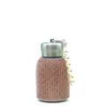 Macro detail of sparkly champagne pink rhinestone thermos with white pearl bead handle - Rose Gold