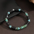 Handmade beaded bracelet with turquoise, black hematite discs, and silver accents - ZJ14947-Black Blue Green Disc Bead Silver Spacer Bracelet