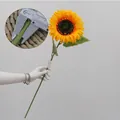 Artificial yellow sunflower stem, 70cm tall with 18cm flower head and two green leaves - Type B Large Single (18cm Diameter)