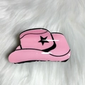Pink cowboy hat hair claw clip with black star pattern on soft white plush background - Bright Pink Black Star Hat Style