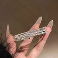 Detailed view of silver multi-layer crystal bracelet worn on wrist with luxury finish - Style 16 (3 Rows) / Silver