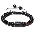 Braided Virgo zodiac bracelet with black glossy beads and a red tiger eye stone - Virgo