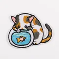 Macro detail of cartoon cat and goldfish embroidery patch with dimensions 5x6.5cm - No.21 (Cat with Fishbowl)