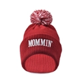 Close-up of red knit beanie with white MOMMIN embroidery and fluffy pom-pom detail - Red