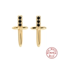 Detailed macro of gold-plated 925 silver dagger earrings with black zircon stones - Gold Sword Black Zirconia / 925 Silver
