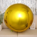 Metallic gold 4D round foil balloon decoration on a modern beige sofa background - 4D Sphere Gold / 32 inch