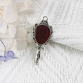 Antique bronze hand mirror pendant with dark red enamel inlay on white knit background - 5-Bronze Red Mirror