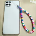 Detail of colorful polymer clay beads and floral charm on a stylish phone lanyard strap - Multicolor Stitching Disc Flower