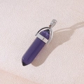 Polished purple amethyst hexagonal crystal bullet pendant with silver metal mount - Purple Cat Eye