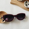 Vintage Y2K cat-eye sunglasses in black with red outline accents for a trendy retro look - Black Frame Red Lines