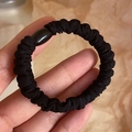 Elastic black pleated hair scrunchie with a glossy oval resin bead detail - Black