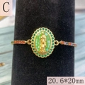 Macro detail of Guadalupe religious bracelet with green crystals and colorful zircons - Style C-Green