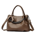 Dark brown pebbled leather shoulder bag with metallic chain and bow charm detail - Oak