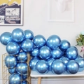 Metallic blue decorative party balloons arranged on table and in gold wire basket - Metallic Blue - Small