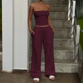 Women's burgundy two-piece set featuring a bandeau top and wide-leg drawstring pants - S / Fuschia