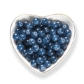 Polished deep blue candy-colored glass beads in a white heart bowl for DIY jewelry making - Haze Blue