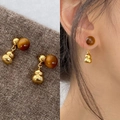 Silver needle tiger eye gourd earrings in geometric design for women on a sweater and model - Gourd Shape Spherical Studs (81#)
