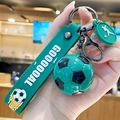 Portachiavi da calcio verde con cinturino in silicone GOOOOOAL e ciondolo atleta - Verde