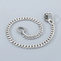 Detail of silver cuban link pants chain with skull spring clasp and circular metal ring - 16" / Skull Clasp