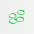 Set of four bright green open jump rings for DIY handmade jewelry crafts on white background - Grass Green
