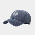 Detail view of washed navy baseball cap with white ENERGY circular embroidery on the side - Adjustable / Navy Blue