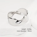 Close-up of polished silver wavy wide cuff bracelet with weight and size details - Irregular Wave Wide Bangle (SL241) / Silver