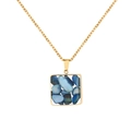 Detail of a square blue stone pendant on a gold stainless steel chain necklace - Blue Stone Square (N2194-GO)