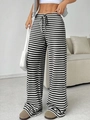 Detailed view of striped wide-leg pants featuring drawstring waist and knit texture - Black & White Stripes