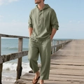 Detail of sage green linen hoody and pants set showing breathable fabric texture by the sea - Army Green