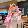 Portachiavi con unicorno rosa con cinturino arcobaleno e gancio in metallo oro - Rosa
