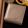 Elegant gold snake chain bracelet with adjustable sliding buckle on gray jewelry box - Pull-out Snake Chain / Gold