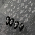 Detailed 3D silver skeleton hand nail stickers with metallic relief on black nails - Metallic Silver Skull Hand (CO-460)