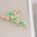 Detail of golden metal hair claw clip with pink strawberry enamel and white pearls - Pink Strawberry Claw / Bulk Packaging