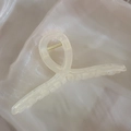 Elegant transparent cross-twist resin shark hair claw clip with golden spring on satin - Glossy Beige