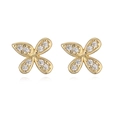 Macro detail of gold butterfly earrings with micro-paved white zircons on white backdrop - Gold White Zirconia
