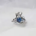 Mini pince à cheveux argentée avec boule scintillante bleue et breloque étoile - Planète Bleue de Rêve / 2.5cm