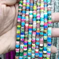 Close-up of assorted colorful 3x6mm natural stone spacer beads for DIY jewelry making - Mixed Multicolor