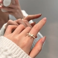 Elegant s925 silver pearl ring featuring a bow knot design with sparkling zircons - Silver Pearl Butterfly (JZ0721)