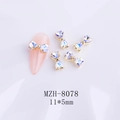 Detail view of aurora crystal bow nail charms with 11x5mm size measurements - White Moonlight Gold Base Bow (8078)