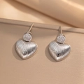 Silver textured heart drop earrings with round cubic zirconia on beige silk background - Steel Color (244)