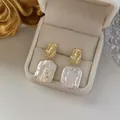 Elegant 14K gold plated baroque pearl earrings in a luxury velvet jewelry box showcase - 1318 Baroque Irregular Pearl