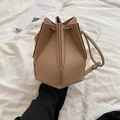 Khaki geometric patchwork bucket bag in matte leather with versatile drawstring closure - Khaki