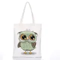 White canvas tote bag featuring a green and brown cartoon owl print with fabric handles - Style C17 / No Zipper No Inner Pocket
