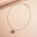 Minimalist silver stainless steel necklace with textured hollow heart pendant for women - Silver