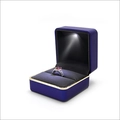 Navy blue LED ring box with gold metal trim and black velvet interior for jewelry - Rounded Corner Gold-rimmed Light Box - Blue (clearance); Ring Box (can Hold Earrings)