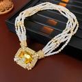 Vintage multi-layer pearl necklace with a gold square pendant and yellow gemstone - Necklace - Gold